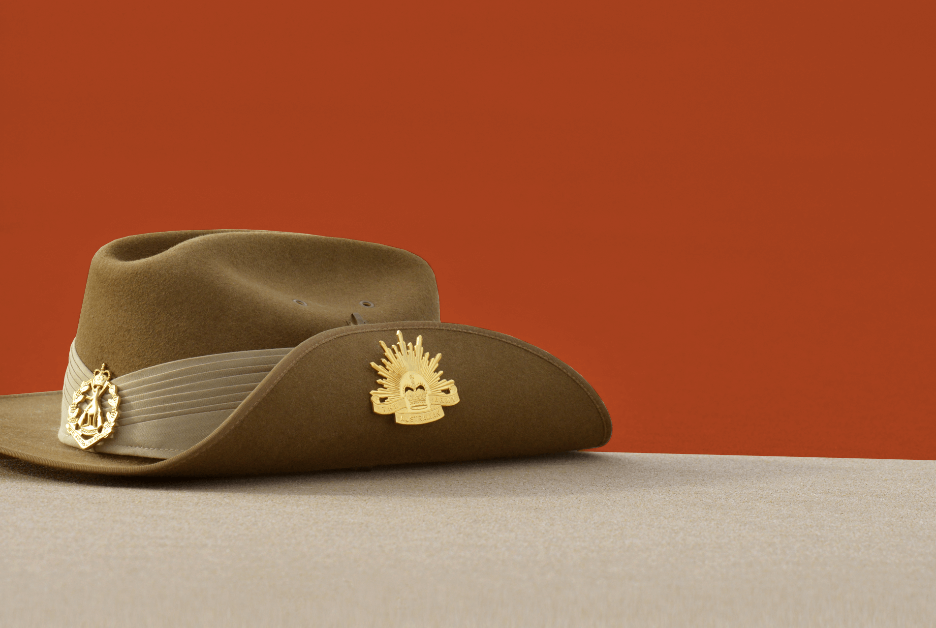 ANZAC Promo, ANZAC hat with army badges, chicken burger with beetroot lettuce and mayo